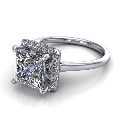 Florence princess halo engagement ring in Platinum, three-quarter perspective showing the brilliant princess-cut center diamond inside a slim pave halo on a thin knife-edge band