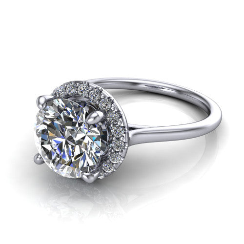 Florence round halo engagement ring in 14K White Gold, three-quarter perspective showing the brilliant round center diamond inside a slim pave halo on a thin knife-edge band