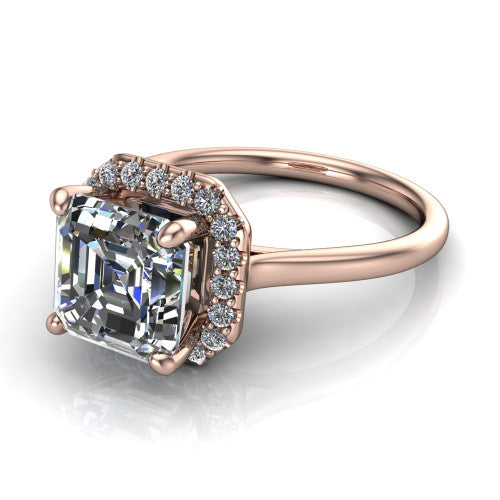 Florence square emerald halo engagement ring in 14K Rose Gold, three-quarter perspective showing the step-cut square emerald center diamond inside a slim pave halo on a thin knife-edge band