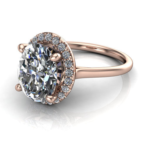 Florence oval halo engagement ring in 18K Rose Gold, three-quarter perspective showing the brilliant oval center diamond inside a slim pave halo on a thin knife-edge band