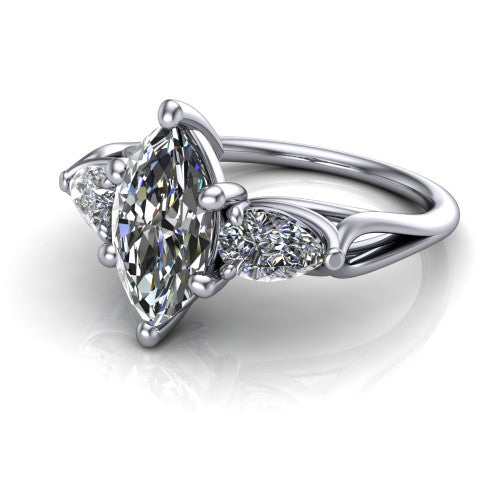 Journee marquise three stone engagement ring in 14K White Gold, three-quarter perspective showing the brilliant marquise center diamond flanked by two pear side diamonds set sideways on tapered cathedral shoulders
