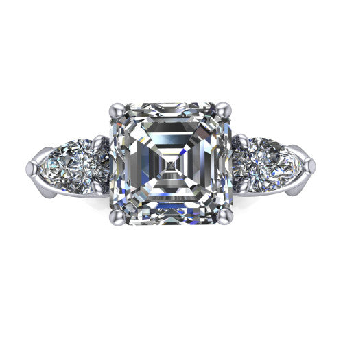 Journee square emerald three stone engagement ring in Platinum, top-down view showing the step-cut square emerald center diamond with two pear side diamonds pointing outward