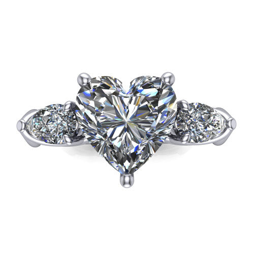 Journee heart three stone engagement ring in Platinum, top-down view showing the brilliant heart-shaped center diamond with two pear side diamonds pointing outward