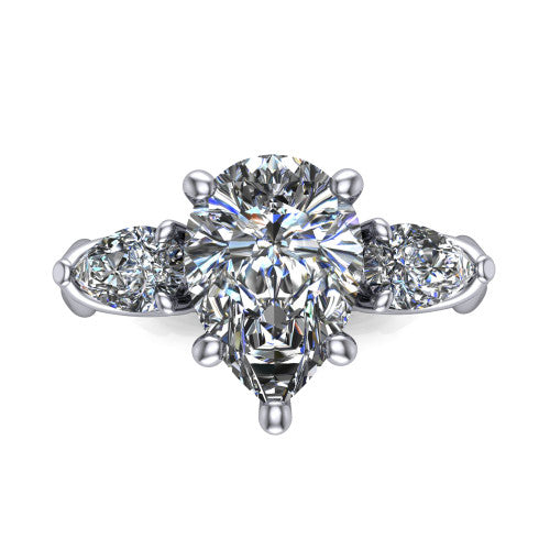 Journee pear three stone engagement ring in 14K White Gold, top-down view showing the brilliant pear-cut center diamond with two pear side diamonds pointing outward