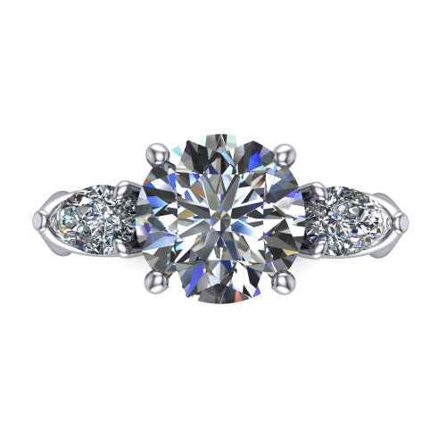 Journee round three stone engagement ring in Platinum, top-down view showing the brilliant round center diamond with two pear side diamonds pointing outward
