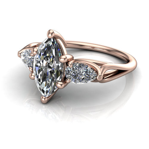 Journee marquise three stone engagement ring in 14K Rose Gold, three-quarter perspective showing the brilliant marquise center diamond flanked by two pear side diamonds set sideways on tapered cathedral shoulders