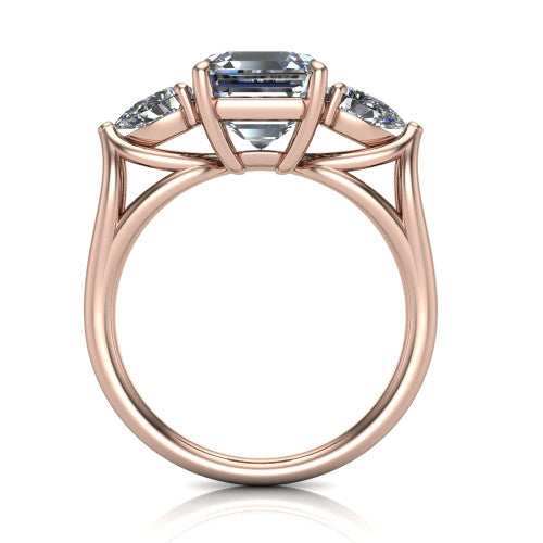 Journee square emerald three stone engagement ring in 14K Rose Gold, through-finger front profile showing the three-stone head and split-V under-gallery