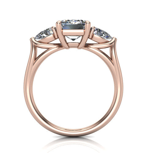 Journee emerald three stone engagement ring in 18K Rose Gold, through-finger front profile showing the three-stone head and split-V under-gallery
