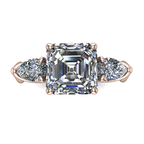 Journee square emerald three stone engagement ring in 14K Rose Gold, top-down view showing the step-cut square emerald center diamond with two pear side diamonds pointing outward