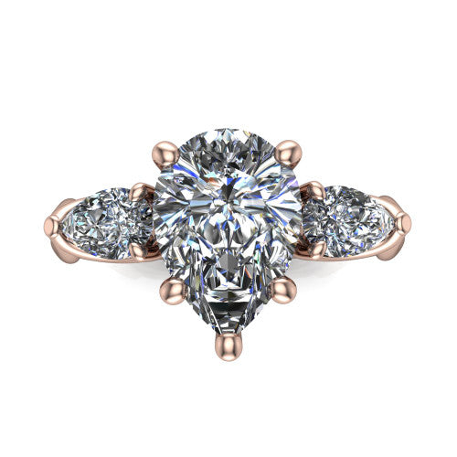 Journee pear three stone engagement ring in 14K Rose Gold, top-down view showing the brilliant pear-cut center diamond with two pear side diamonds pointing outward
