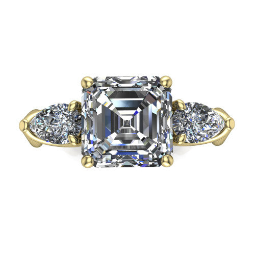 Journee square emerald three stone engagement ring in 14K Yellow Gold, top-down view showing the step-cut square emerald center diamond with two pear side diamonds pointing outward