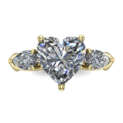 Journee heart three stone engagement ring in 14K Yellow Gold, top-down view showing the brilliant heart-shaped center diamond with two pear side diamonds pointing outward