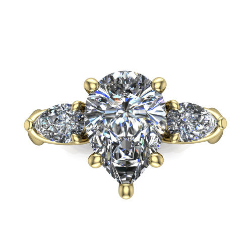 Journee pear three stone engagement ring in 14K Yellow Gold, top-down view showing the brilliant pear-cut center diamond with two pear side diamonds pointing outward