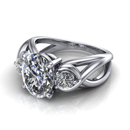 Ottilie marquise three stone engagement ring in 14K White Gold, three-quarter perspective showing the brilliant marquise center diamond flanked by two round side diamonds on a braided ribbon shank