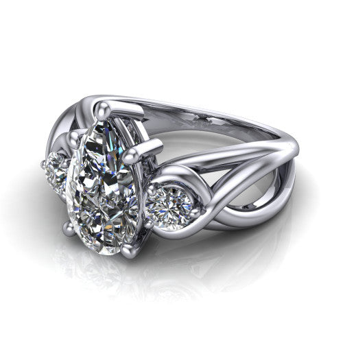 Ottilie pear three stone engagement ring in 18K White Gold, three-quarter perspective showing the brilliant pear-cut center diamond flanked by two round side diamonds on a braided ribbon shank