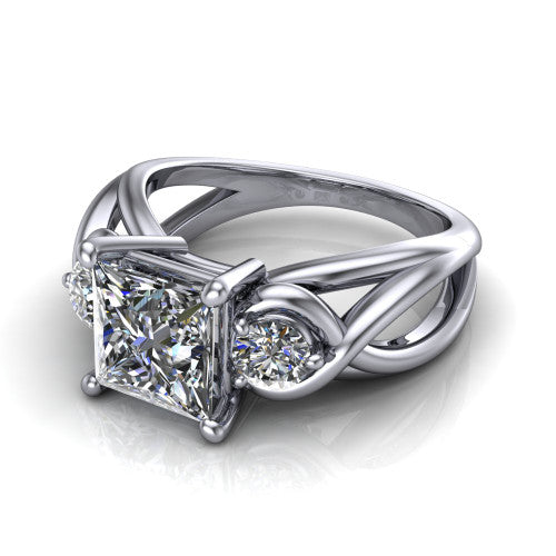 Ottilie princess three stone engagement ring in 14K White Gold, three-quarter perspective showing the brilliant princess-cut center diamond flanked by two round side diamonds on a braided ribbon shank