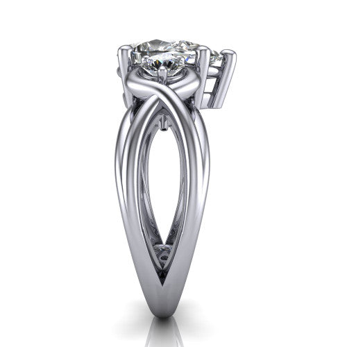 Ottilie pear three stone engagement ring in 14K White Gold, side profile showing the braided ribbon shank with multiple bands twisting beneath the head