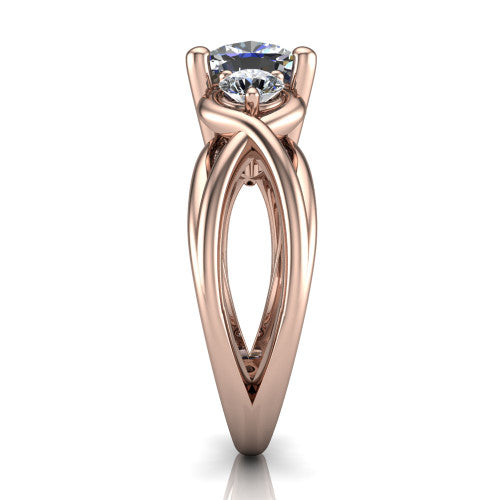 Ottilie cushion three stone engagement ring in 14K Rose Gold, side profile showing the braided ribbon shank with multiple bands twisting beneath the head