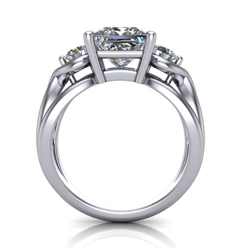 Ottilie princess three stone engagement ring in 18K White Gold, through-finger front profile showing the three-stone head and sculpted scroll basket