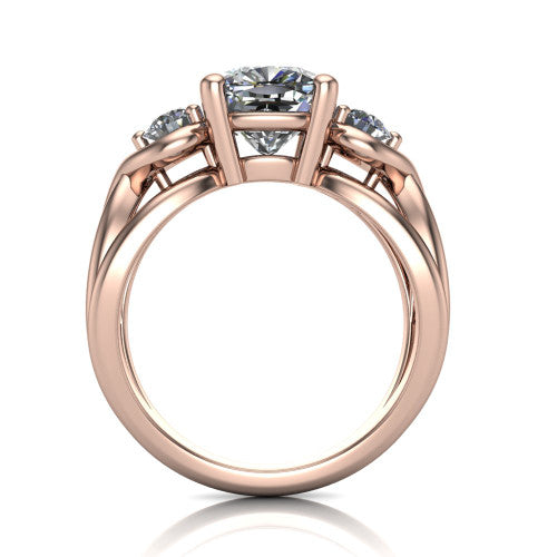 Ottilie cushion three stone engagement ring in 18K Rose Gold, through-finger front profile showing the three-stone head and sculpted scroll basket