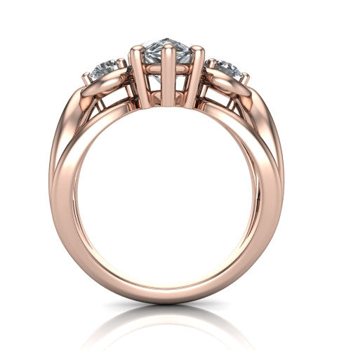 Ottilie pear three stone engagement ring in 14K Rose Gold, through-finger front profile showing the three-stone head and sculpted scroll basket