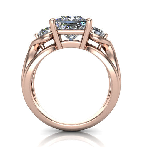 Ottilie princess three stone engagement ring in 14K Rose Gold, through-finger front profile showing the three-stone head and sculpted scroll basket