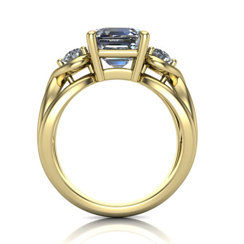 Ottilie square emerald three stone engagement ring in 18K Yellow Gold, through-finger front profile showing the three-stone head and sculpted scroll basket