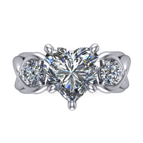 Ottilie heart three stone engagement ring in 18K White Gold, top-down view showing the brilliant heart-shaped center diamond with two matched round side diamonds