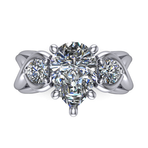 Ottilie pear three stone engagement ring in 14K White Gold, top-down view showing the brilliant pear-cut center diamond with two matched round side diamonds