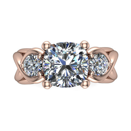 Ottilie cushion three stone engagement ring in 14K Rose Gold, top-down view showing the brilliant cushion-cut center diamond with two matched round side diamonds