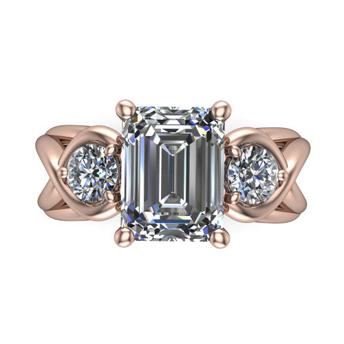 Ottilie emerald three stone engagement ring in 14K Rose Gold, top-down view showing the step-cut emerald center diamond with two matched round side diamonds