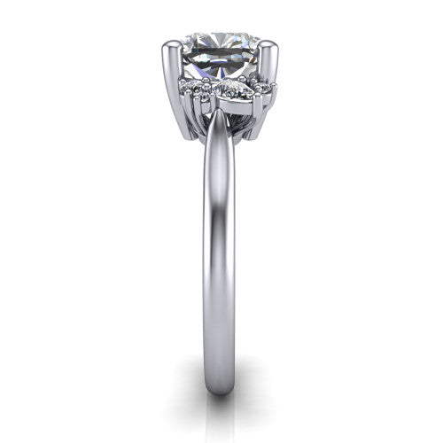 Genevieve cushion three stone engagement ring in 14K White Gold, side profile showing the cluster head, tapered cathedral shoulders, and polished band