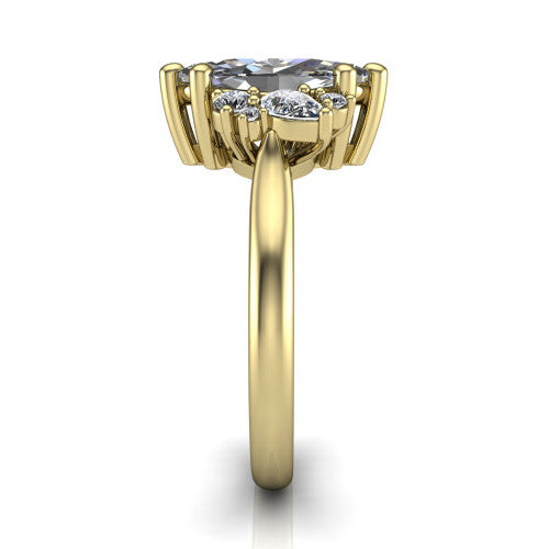 Genevieve marquise three stone engagement ring in 14K Yellow Gold, side profile showing the cluster head, tapered cathedral shoulders, and polished band