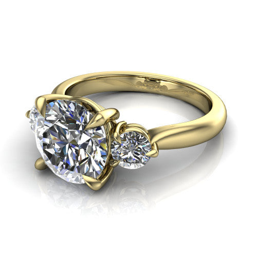 Juniper round three stone engagement ring in 14K Yellow Gold, three-quarter perspective showing the brilliant round center diamond flanked by two round side diamonds on a rounded plain band