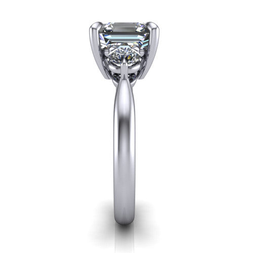 Juniper square emerald three stone engagement ring in 18K White Gold, side profile showing the three-stone head and slim rounded polished band