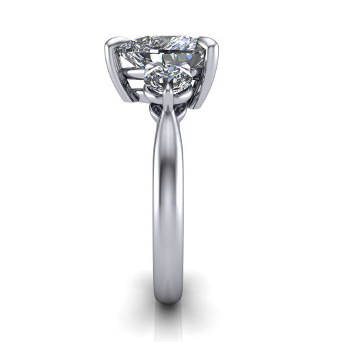 Juniper heart three stone engagement ring in Platinum, side profile showing the three-stone head and slim rounded polished band