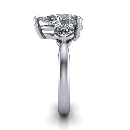 Juniper pear three stone engagement ring in 14K White Gold, side profile showing the three-stone head and slim rounded polished band