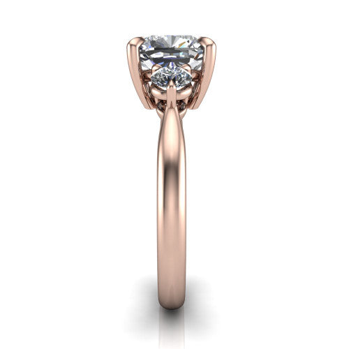 Juniper cushion three stone engagement ring in 14K Rose Gold, side profile showing the three-stone head and slim rounded polished band