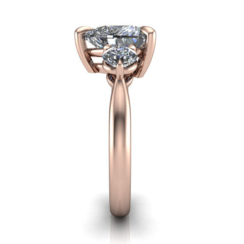 Juniper heart three stone engagement ring in 18K Rose Gold, side profile showing the three-stone head and slim rounded polished band
