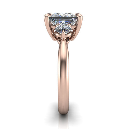 Juniper princess three stone engagement ring in 18K Rose Gold, side profile showing the three-stone head and slim rounded polished band