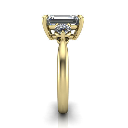 Juniper emerald three stone engagement ring in 14K Yellow Gold, side profile showing the three-stone head and slim rounded polished band