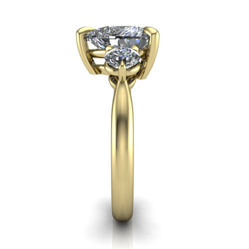 Juniper heart three stone engagement ring in 18K Yellow Gold, side profile showing the three-stone head and slim rounded polished band