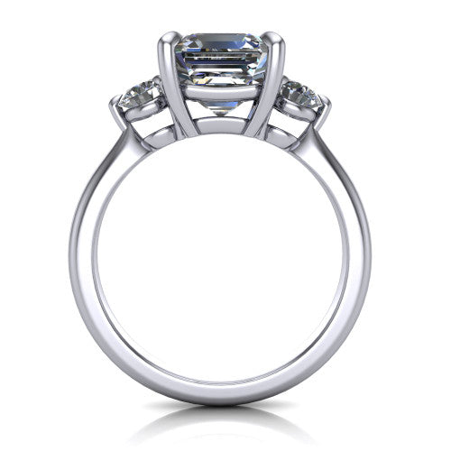 Juniper square emerald three stone engagement ring in 18K White Gold, through-finger front profile showing the three-stone head and clean open under-gallery