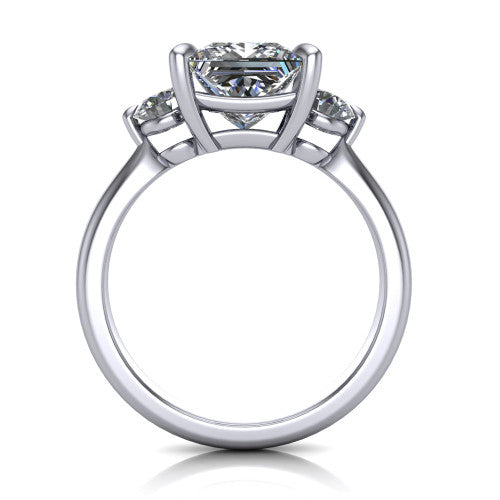 Juniper princess three stone engagement ring in Platinum, through-finger front profile showing the three-stone head and clean open under-gallery