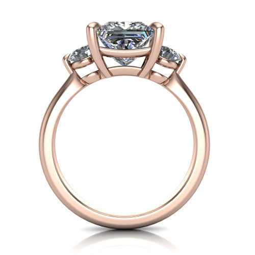 Juniper princess three stone engagement ring in 18K Rose Gold, through-finger front profile showing the three-stone head and clean open under-gallery
