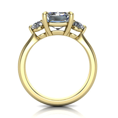 Juniper emerald three stone engagement ring in 18K Yellow Gold, through-finger front profile showing the three-stone head and clean open under-gallery