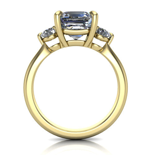 Juniper square emerald three stone engagement ring in 14K Yellow Gold, through-finger front profile showing the three-stone head and clean open under-gallery