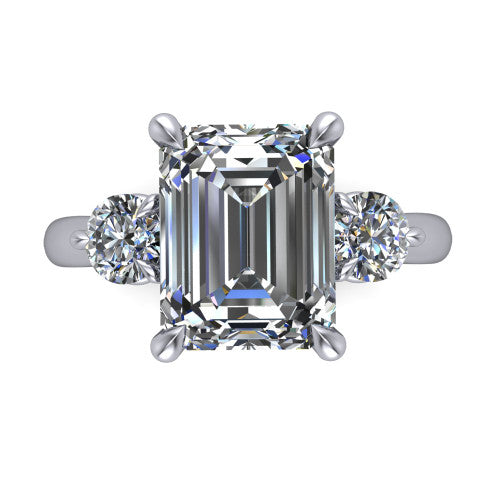 Juniper emerald three stone engagement ring in 18K White Gold, top-down view showing the step-cut emerald center diamond with two matched round side diamonds