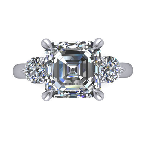Juniper square emerald three stone engagement ring in Platinum, top-down view showing the step-cut square emerald center diamond with two matched round side diamonds