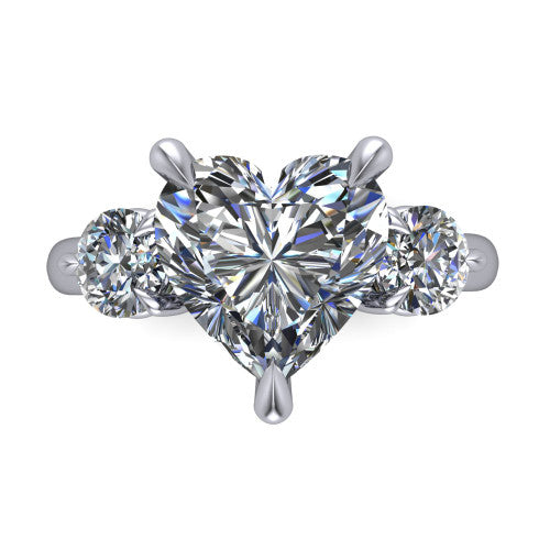 Juniper heart three stone engagement ring in 14K White Gold, top-down view showing the brilliant heart-shaped center diamond with two matched round side diamonds